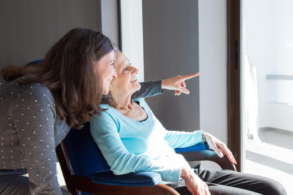 Family caregiver interacts with loved one.
