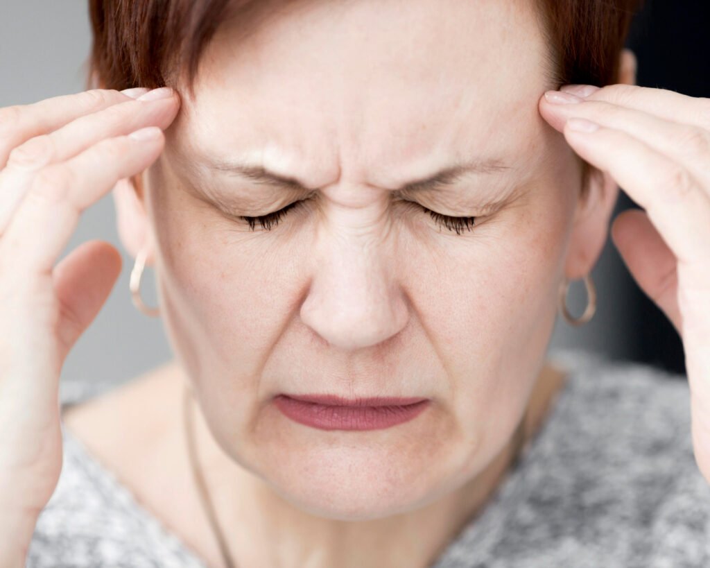 Middle-aged woman experiencing burnout