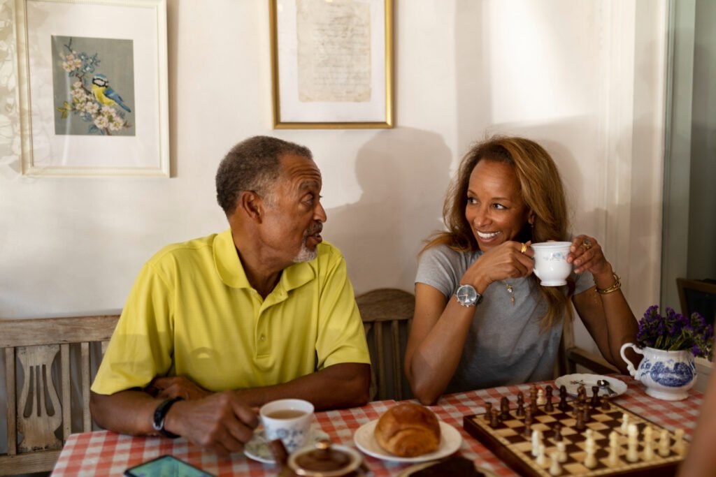 Daughter listens to aging father.