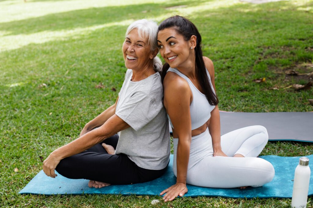 Two friends on yoga mat
