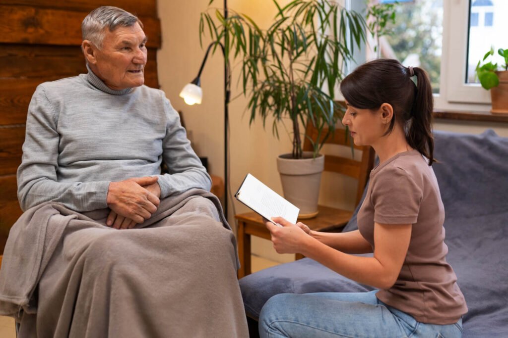 Family caregiver reads to loved one.