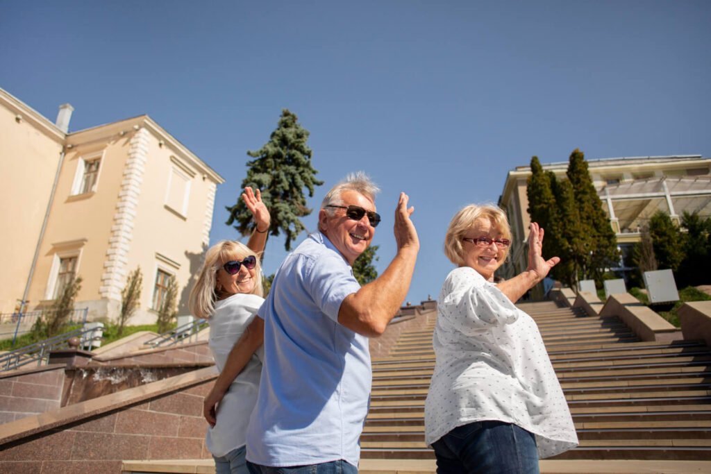 independent-seniors-wave-at-camera