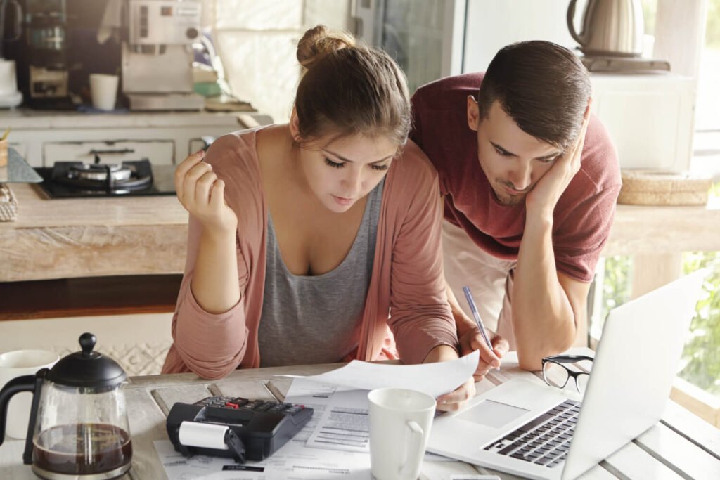 young-caregivers-paying-bills