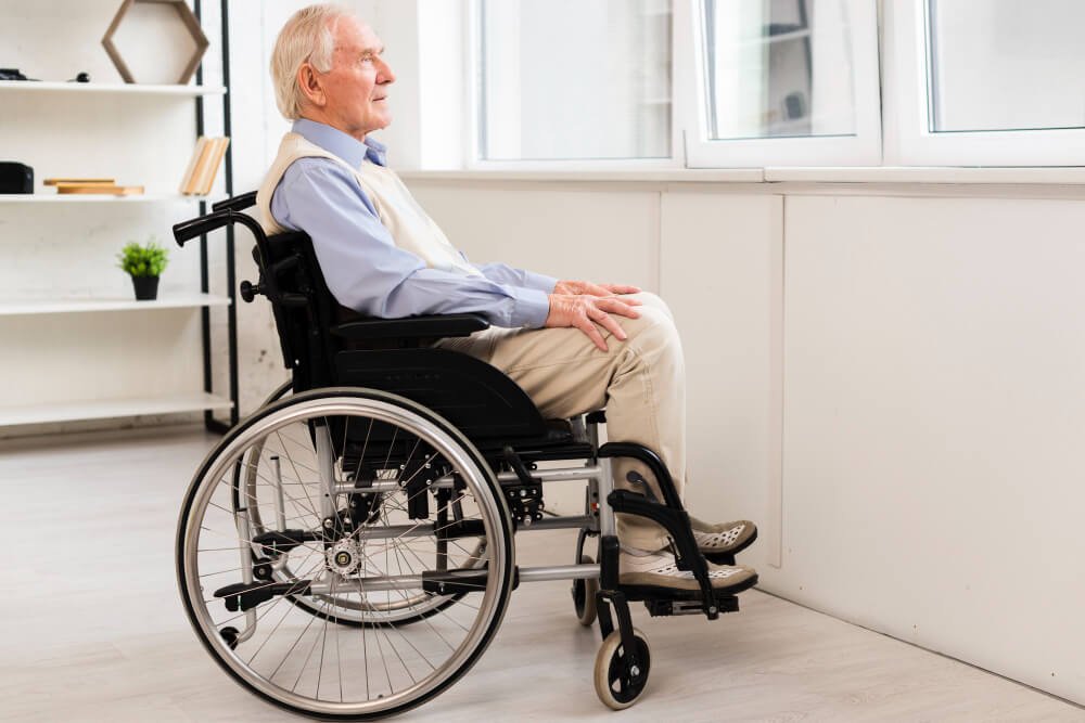 Man sits in wheelchair