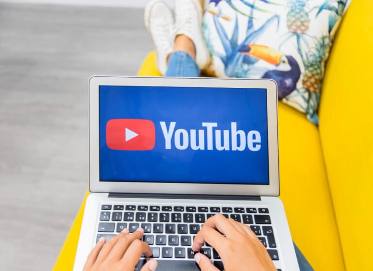 Viewer watching YouTube on laptop