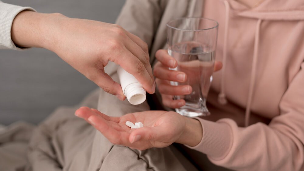 Nursing home patient gets medication.