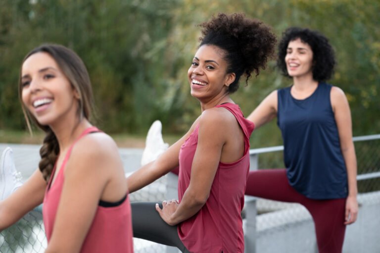 Young women perform stretches to relieve stress