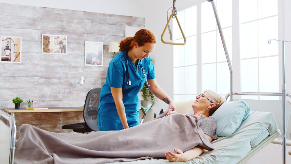 Nurse helps nursing home resident