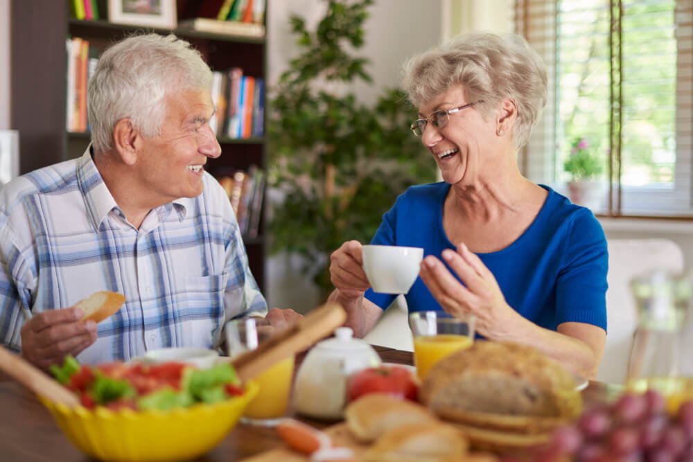 Senior couple enjoys healthy meal