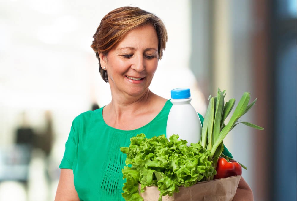 Woman with bag of groceries