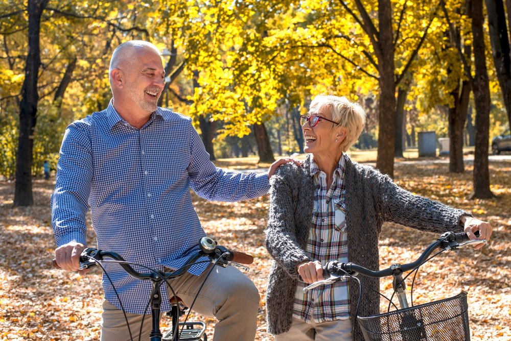 elderly couple rides bicycles as self-care