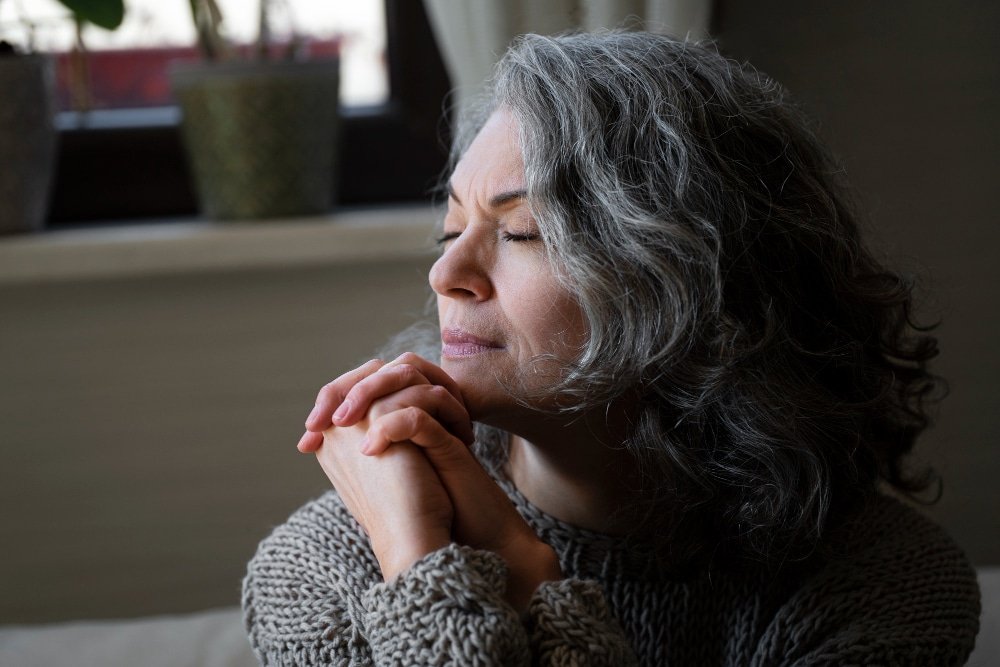 close-up of sad senior woman