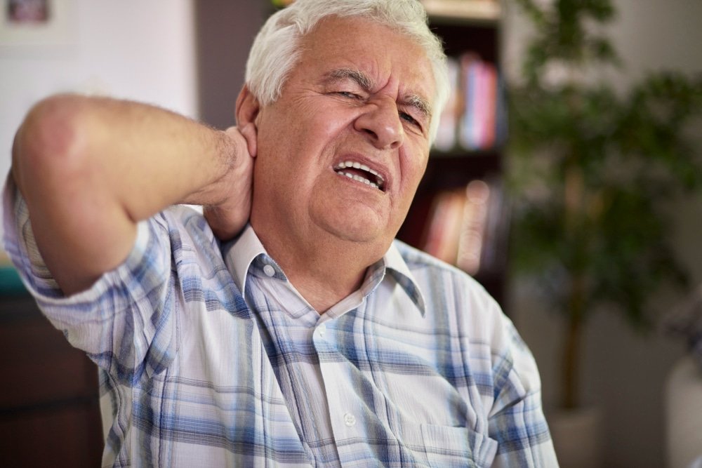 elderly man in pain
