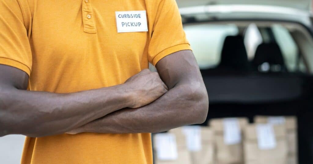 close-up on uniform of curbside pick-up person