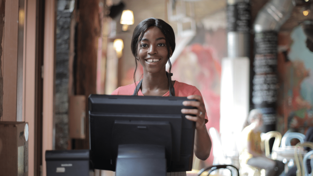 young woman uses elderspeak when addressing senior restaurant customer