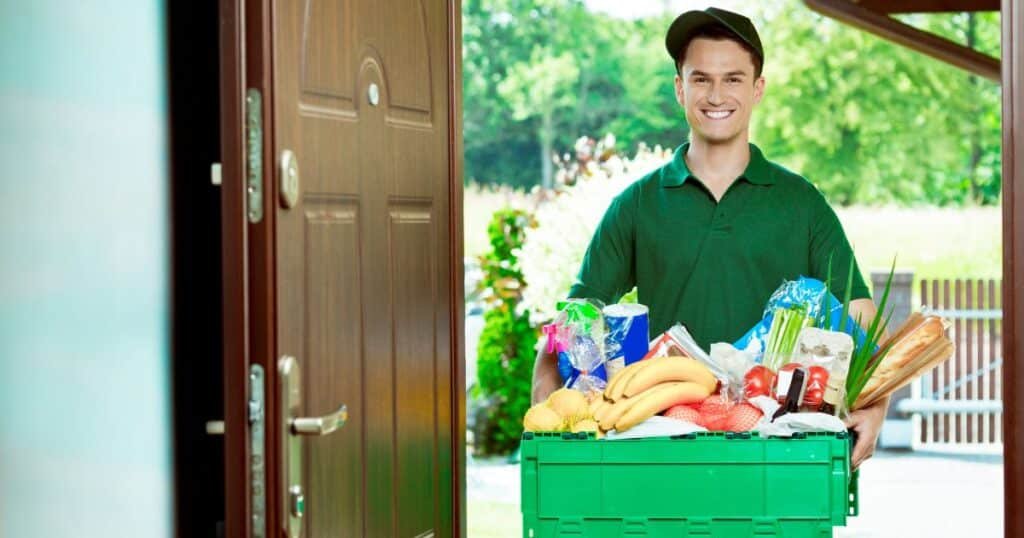 grocery delivery person at door