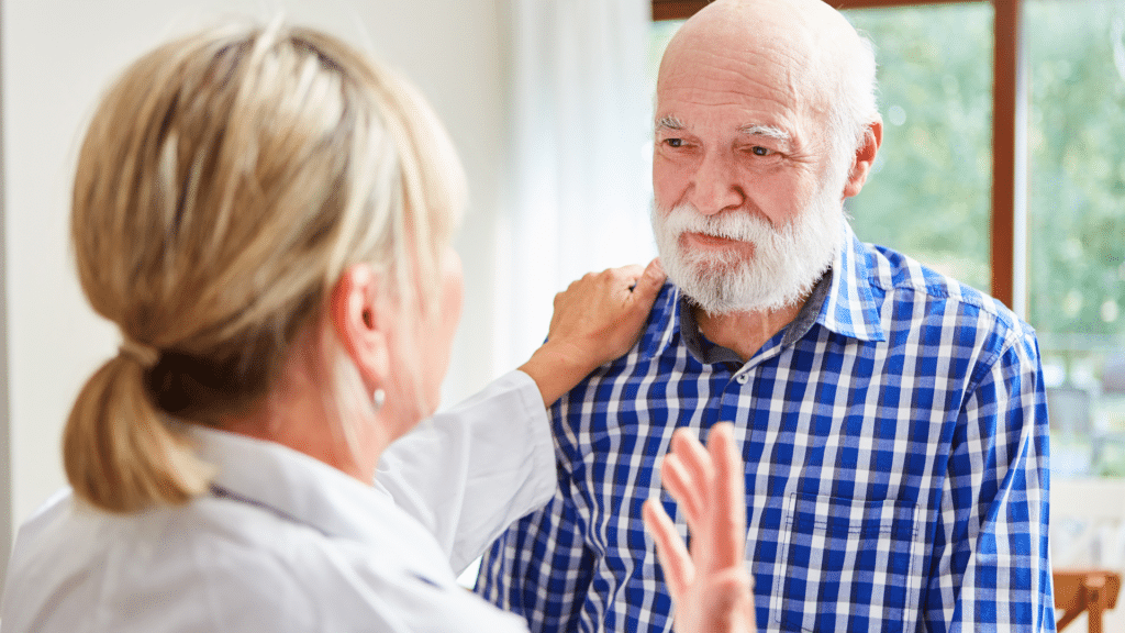 doctor gives senior man dementia diagnosis