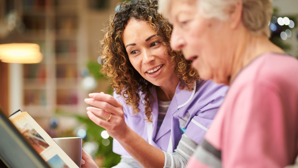 nurse talks to senior woman with dementia