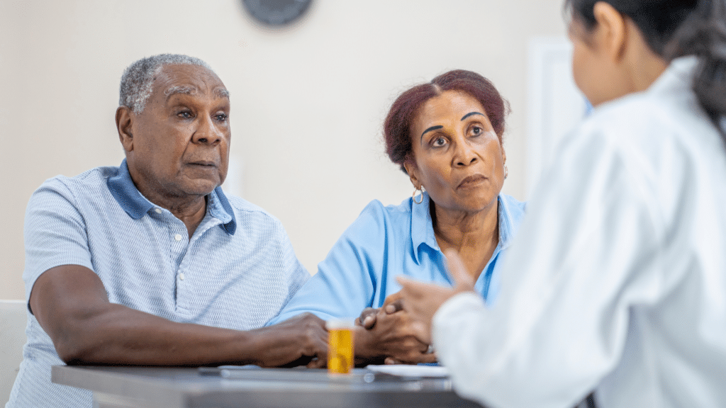 senior spouses talk to doctor